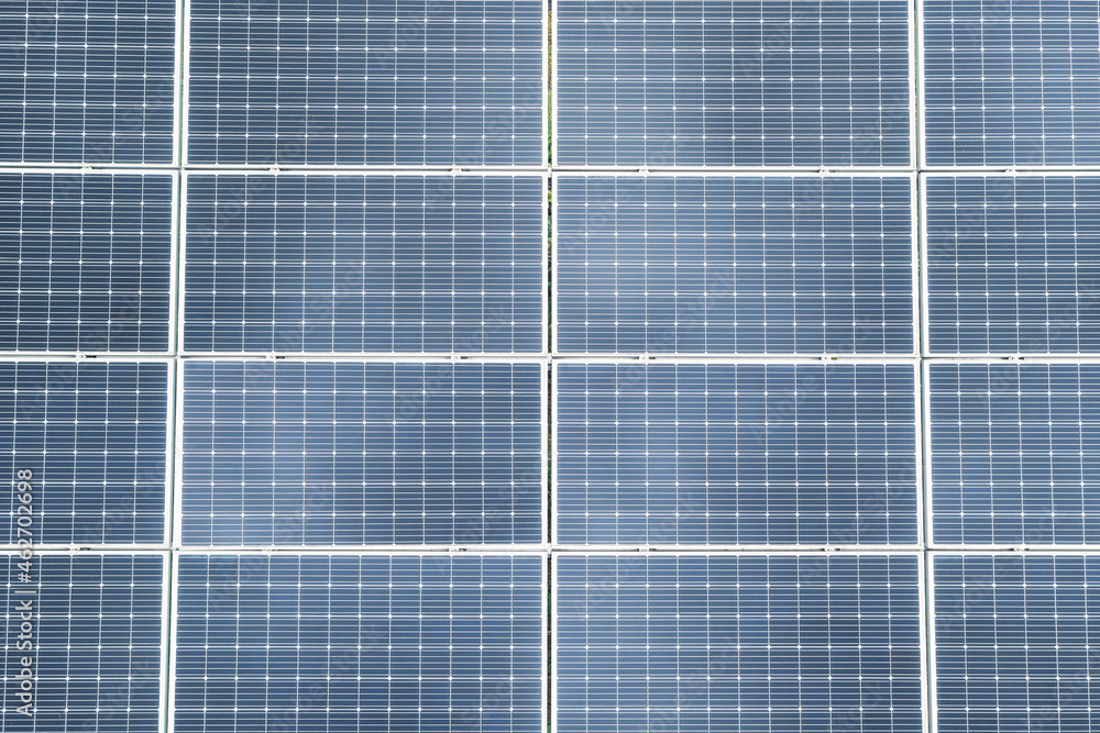 Solar panels on blue sky background, close up Solar panels on blue sky background, close up