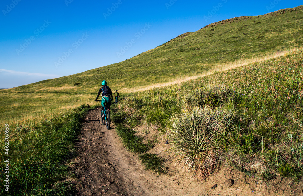 Bicyclist navigates up a hill in Golden, Colorado