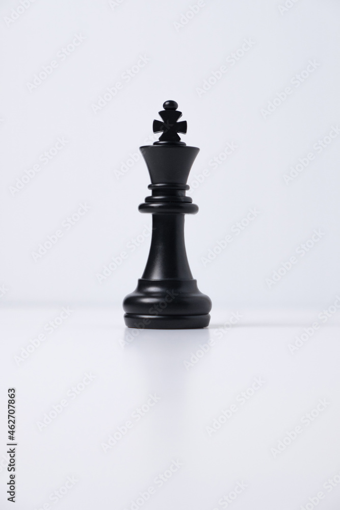 isolated black king chess piece on white background
isolated black king chess piece on white background