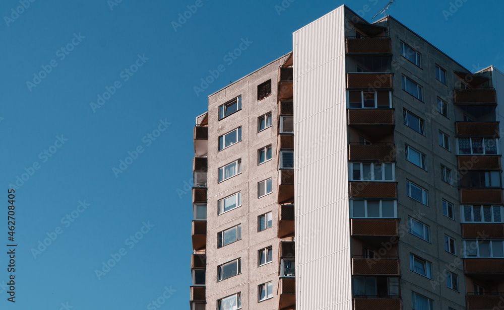 Soviet-style apartment building with balconies.