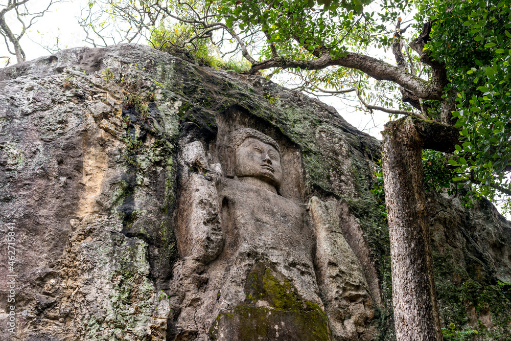 Sri Lanka, Uva Province, Dowa, Exterior of temple with Buddha Sri Lanka, Uva Province, Dowa, Exterior of temple with Buddha