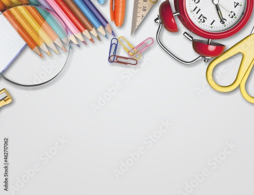 composition with school supplies on a background. Frame of colorful stationery.
