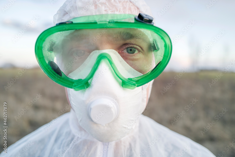Portrait of man wearing protective suit and goggles Portrait of man wearing protective suit and goggles