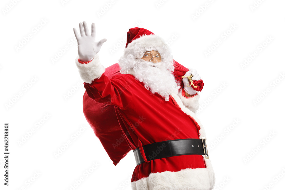 Santa claus waving and carrying a sack of presents Santa claus waving and carrying a sack of presents