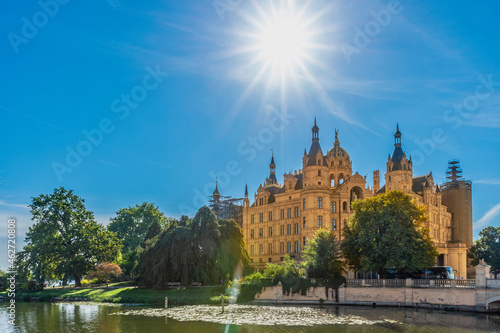 Germany, Mecklenburg-Western Pomerania, Schwerin, Schwerin Palace against the sun photo