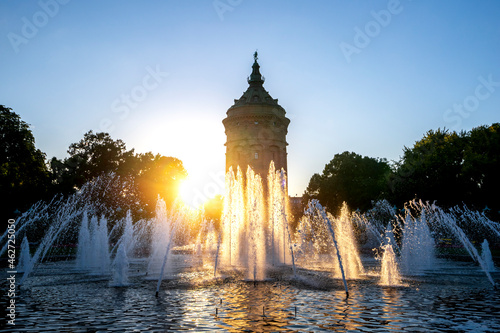 Germany, Baden-Wurttemberg, Mannheim,ÔøΩWasserturm fountain at sunset photo