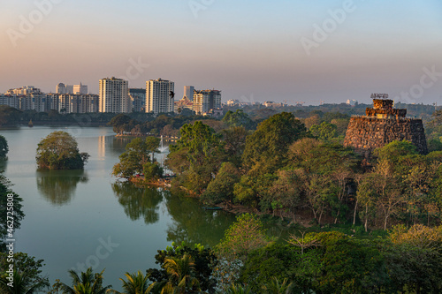 Myanmar, Yangon, Kandawgyi Lake with city skyline at sunset, aerial view photo