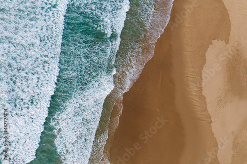 Portugal, Algarve, Drone view of Praia do Amado beach photo