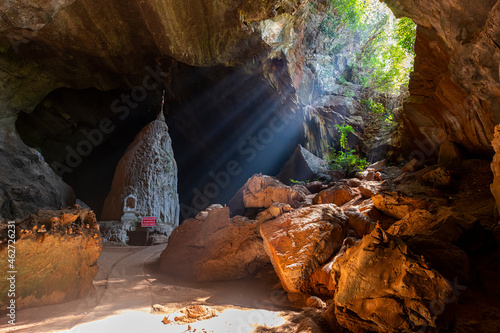 Myanmar, Kayin State, Hpa-an, Sun rays shining inside Saddan Cave photo