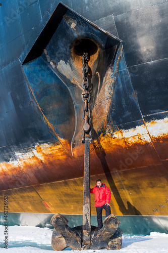 Portrait of man posing on top of anchor of ice-breaker 50 Years of Victory photo