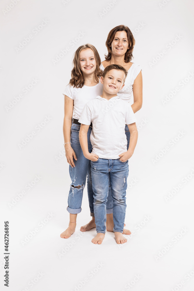 Mother with children standing against white background Mother with children standing against white background