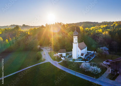 Germany, Bavaria, Fischbach, Drone view of Kirche Saint Johannes at sunrise photo