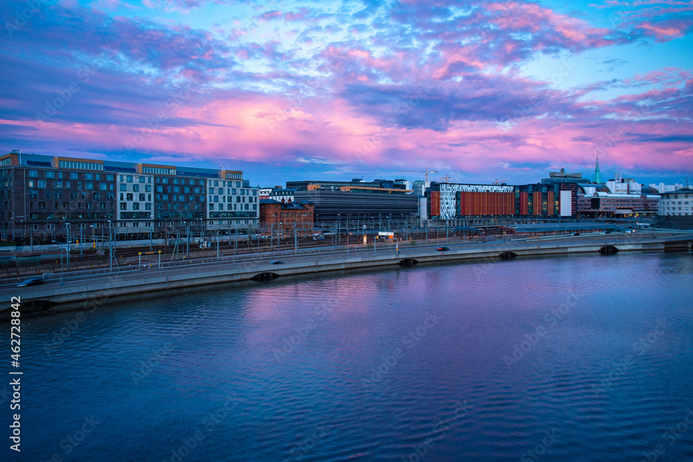 Sweden, Sodermanland, Stockholm, Clouds overÔøΩBarnhusvikenÔøΩnearÔøΩNorrmalmÔøΩcentral station at dusk