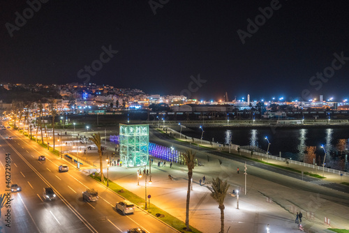 Morocco, Tanger-Tetouan-Al Hoceima, Tangier, Coast of illuminated city at night photo
