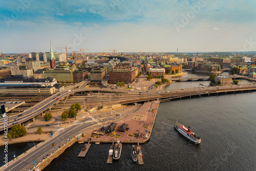 Sweden, Sodermanland, Stockholm, Aerial view of Klara Malarstrand boat arriving at harbor photo