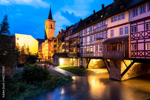 Germany, Erfurt, Karmerbrucke and St Giles church on Gera river at dusk photo