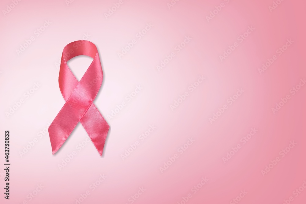 Pink ribbon on pastel background, Breast cancer awareness concept Pink ribbon on pastel background, Breast cancer awareness concept