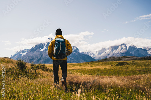 Man hiking on mountain of Torres Del Paine National Park, Patagonia, South America photo