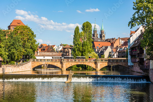 Germany, Bavaria, Nuremberg, Maxbrucke with old town buildings in background photo