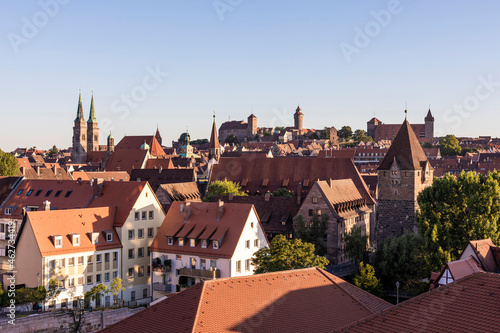 Germany, Bavaria, Nuremberg, Clear sky over historical old town at dusk photo