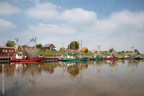 Germany, Lower Saxony, Krummhorn, shrimp boats moored in Greetsiel photo