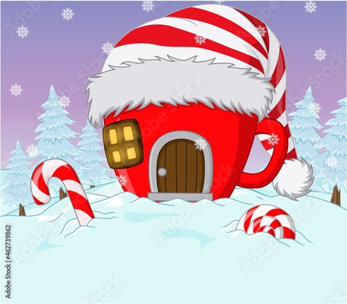 Christmas house in the form of cup with santa hat and candies