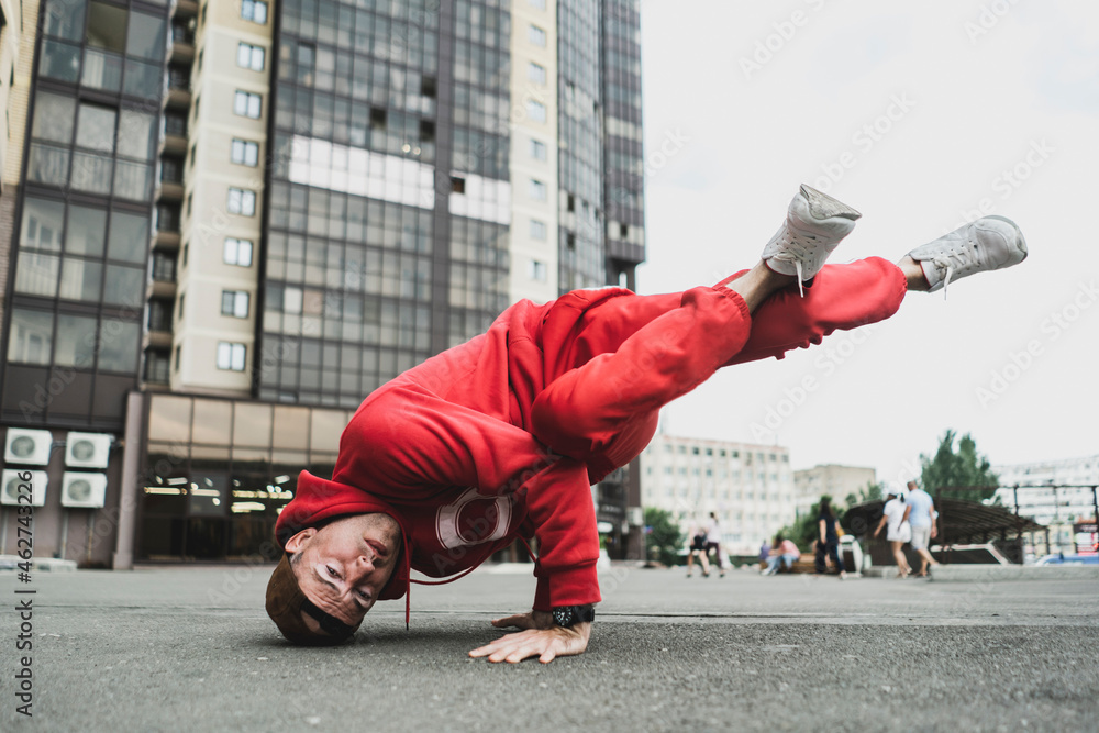 Fototapeta premium a bboy break dance freeze outdoors, hip hop movement