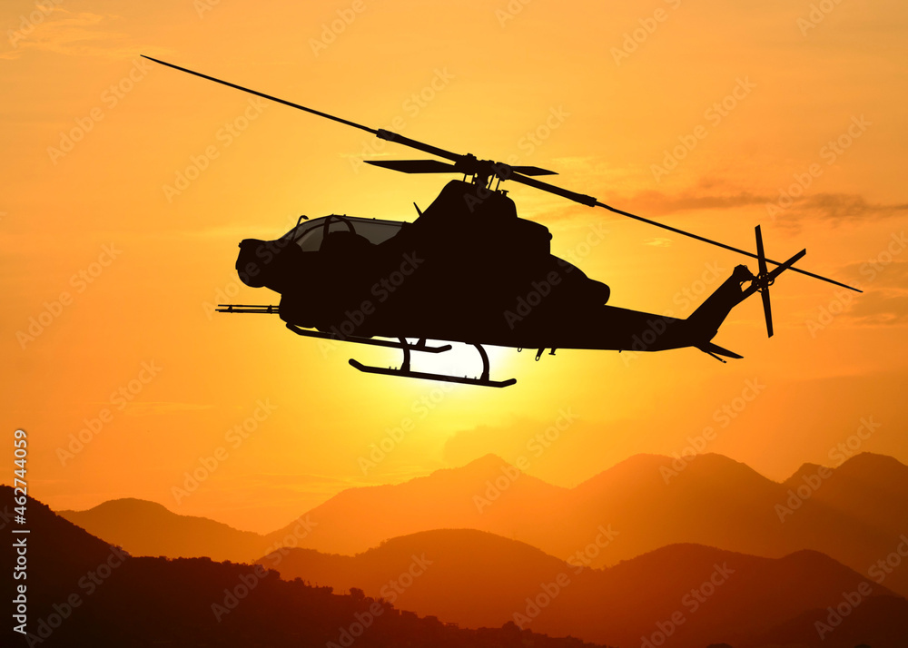American attack helicopter silhouette in the flight American attack helicopter silhouette in the flight