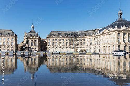 France, Gironde, Bordeaux, Place de la Bourse reflecting in Miroir dEau pool photo
