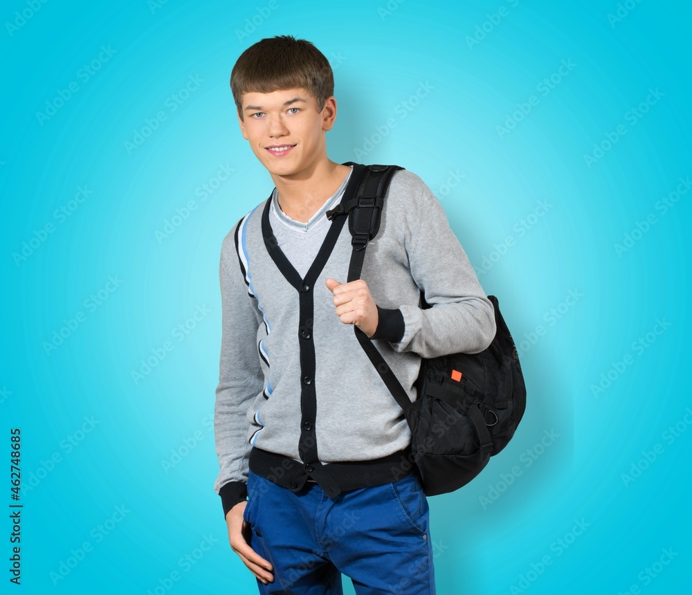 Young boy teen student wear casual clothes and backpack posing Young boy teen student wear casual clothes and backpack posing