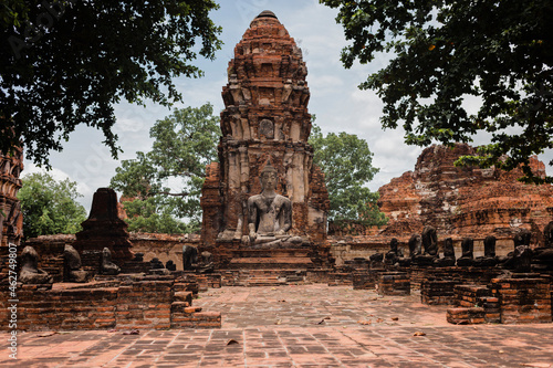 Ancient Buddha statue at temple in Ayutthaya, Thailand, Asia photo