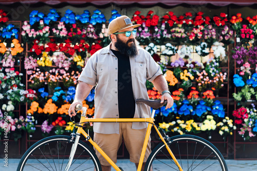 Portrait of bearded man with fixie bike photo