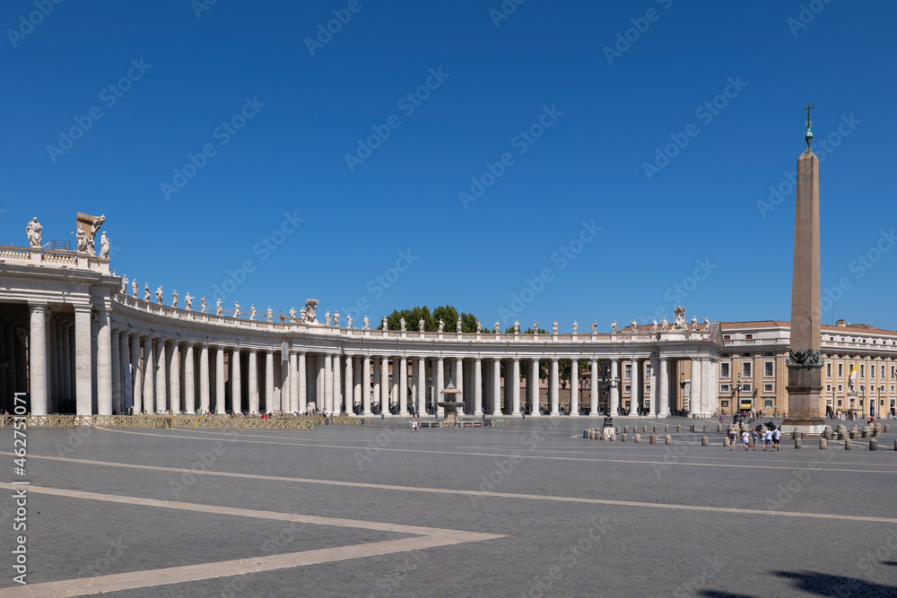 Colonnades and obelisk at St. Peter's Square against clear blue sky, Vatican City, Italy Colonnades and obelisk at St. Peter's Square against clear blue sky, Vatican City, Italy