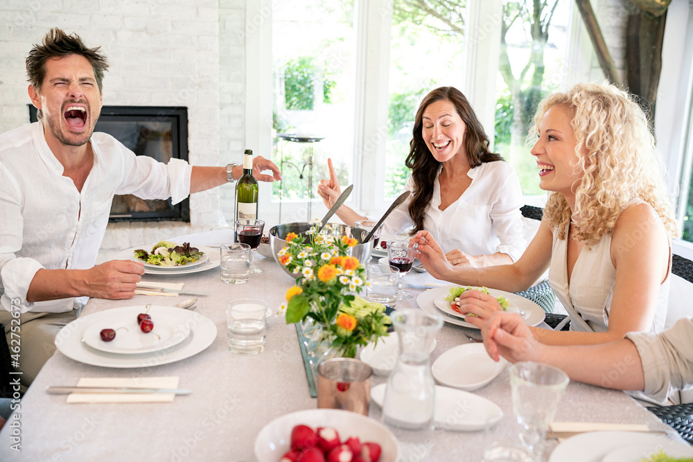 Excited man screaming on a family celebration Excited man screaming on a family celebration