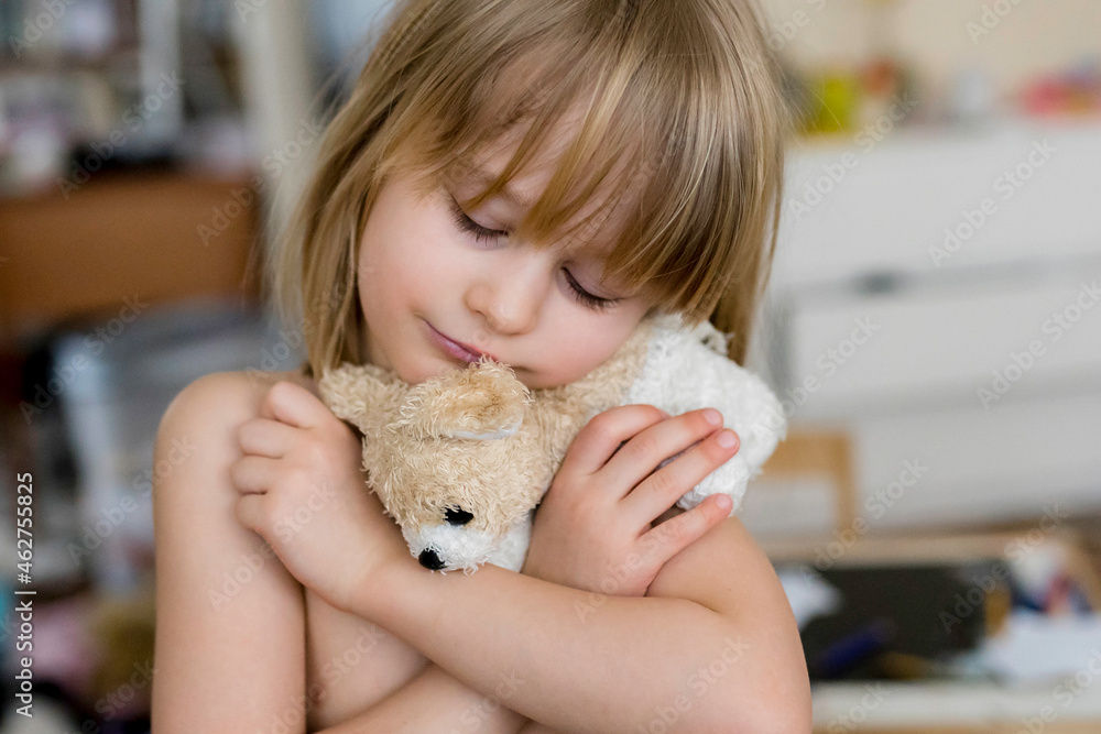 Portrait of little girl with cuddly toy Portrait of little girl with cuddly toy