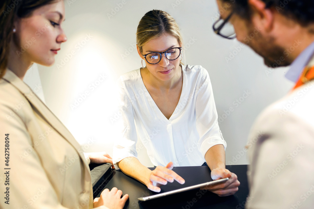 Business people meeting at reception in modern office Business people meeting at reception in modern office