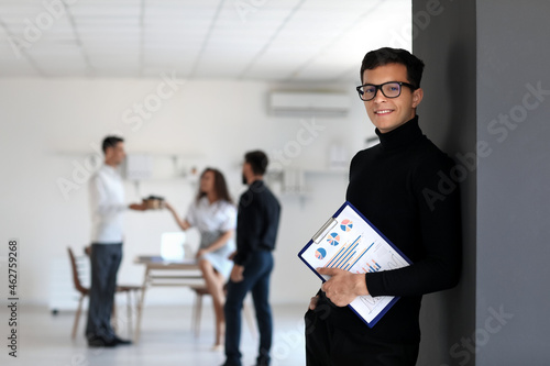 Young businessman with clip...