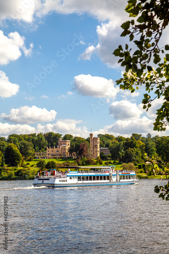 View to Babelsberg Castle with tourboat on Havel in the foreground, Potsdam, Germany photo