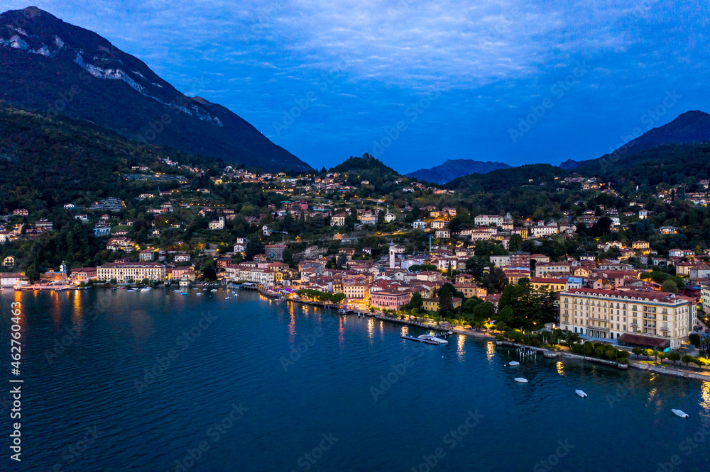 Italy, Province of Como, Menaggio, Helicopter view of town on shore of Lake Como at dawn Italy, Province of Como, Menaggio, Helicopter view of town on shore of Lake Como at dawn