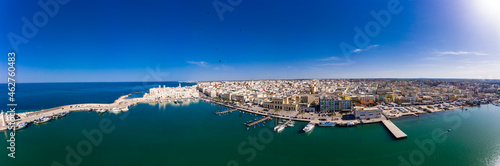 Italy, Province of Bari, Molfetta, Drone panorama of coastal town in summer photo