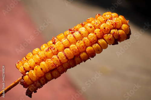 Sticker Deep fried corn kernels on a stick