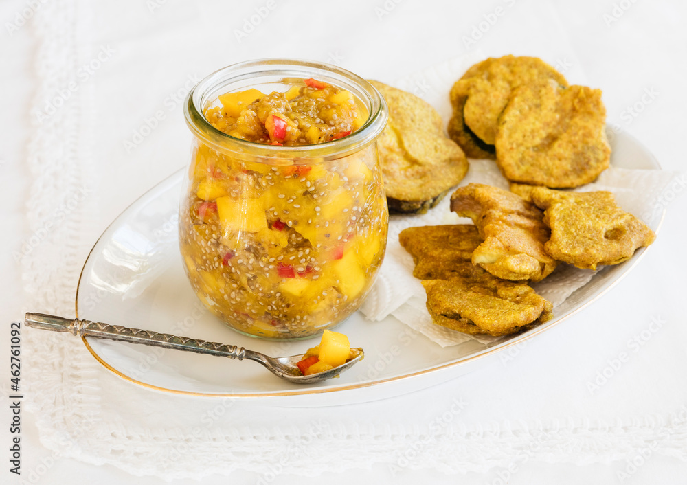 Plate of deep fried vegetables with mango chutney Plate of deep fried vegetables with mango chutney