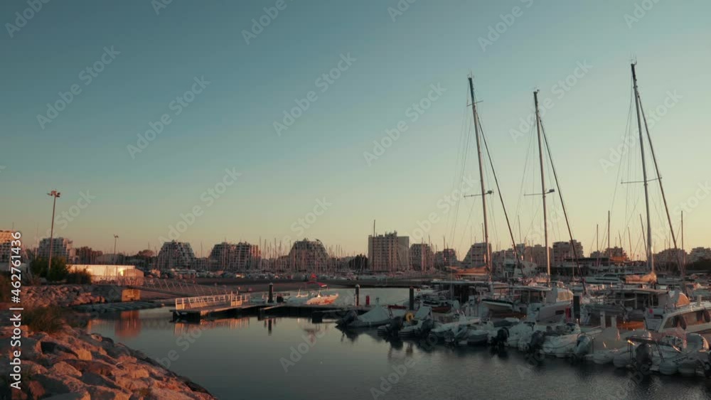Watch the sunrise between the sea, the city and the yachts, La Grande - Motte, Montpellier Watch the sunrise between the sea, the city and the yachts, La Grande - Motte, Montpellier