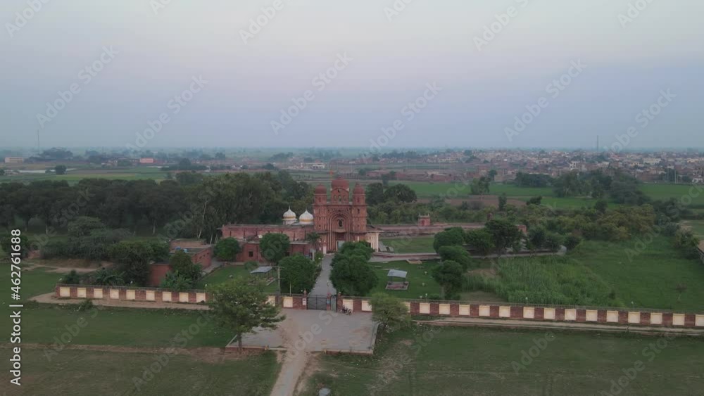 Drone view of Gurdwara Rori Sahib located in a small village called Eminabad in Punjab, Pakistan. 4K Footage Drone view of Gurdwara Rori Sahib located in a small village called Eminabad in Punjab, Pakistan. 4K Footage