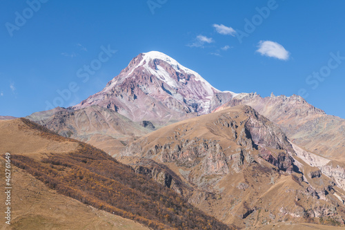 Georgia, Greater Caucasus, Stepantsminda, view on Mount Kazbek photo