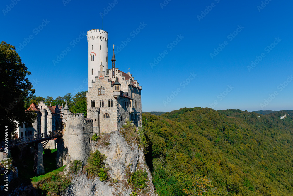 Castle Lichtenstein against clear blue sky on sunny day, Swabian Alb, Germany Castle Lichtenstein against clear blue sky on sunny day, Swabian Alb, Germany