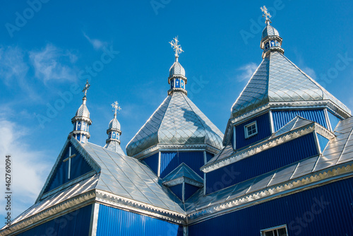 Blue wooden church, near Buchach, Ukraine photo