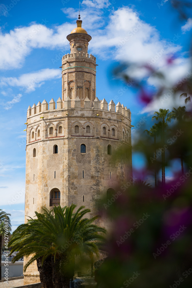 Peculiar architecture of medieval military watch tower Torre del Oro in Seville, Spain