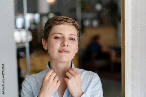 Portrait of a confident woman in a cafe photo