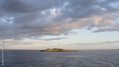 Overcast Sky Over Lille Torungen Lighthouse In Arendal, Agder County, Norway - aerial drone shot photo